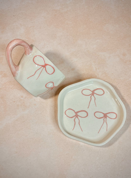 Handmade Ceramic Cup & Saucer Set with Pink Bow Design – Minimalist Pottery