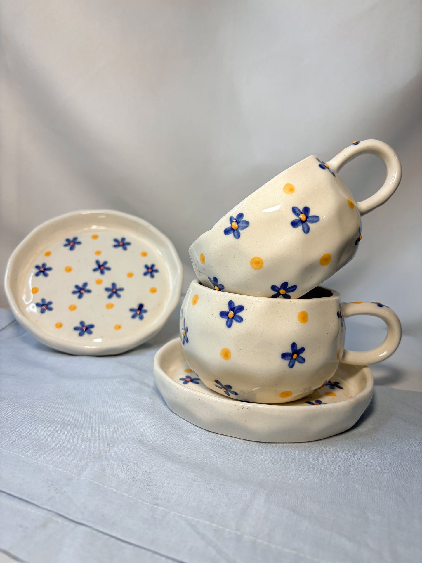 Handmade Ceramic Cup with Saucer – Blue Daisy & Sunshine Dots | Pankhhari Home
