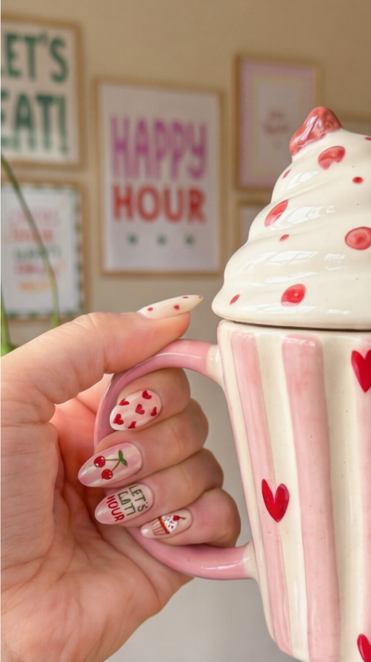 Cherry swirl mug lid detail – playful ceramic coffee cup by Pankhhari
