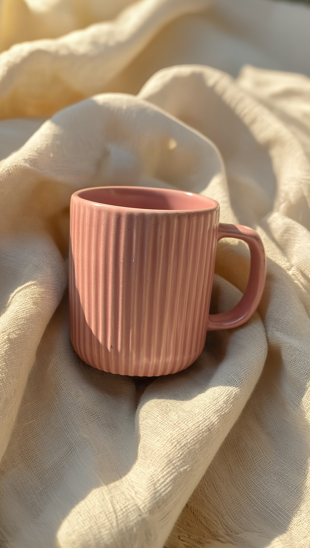 Luxury ribbed ceramic mug in pastel butter yellow, blush pink, and grey blue — handmade by Pankhhari
